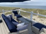 Plenty of comfortable outdoor seating overlooking the ocean